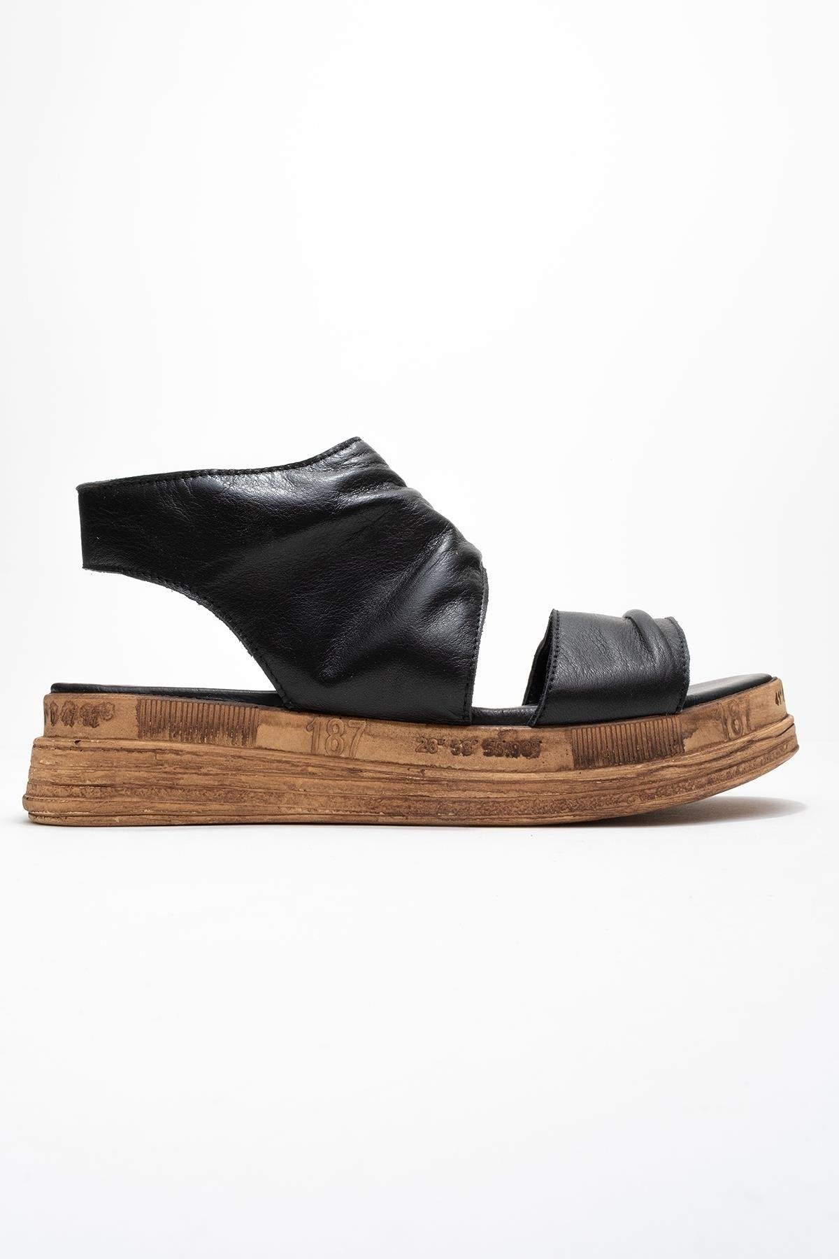 Lunas Black Leather SideāZip Flat Heel Sandal (Women) - Image 6